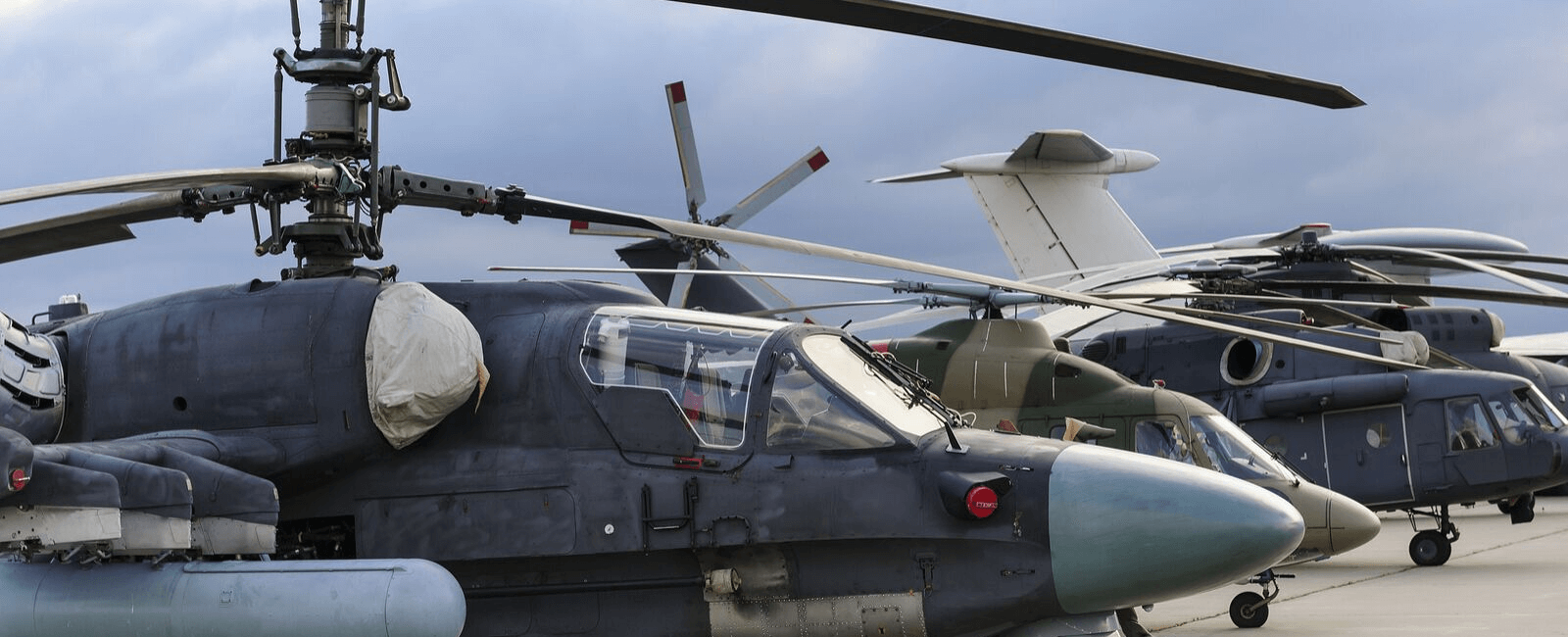 Military helicopters and reconnaissance aircrafts in modern army aviation and aerospace industry